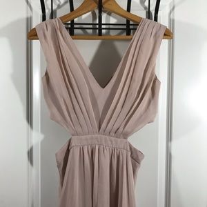 Pale pink maxi dress with waist cut outs.